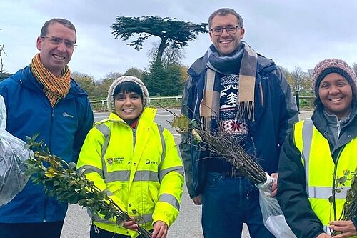 Peter and Cllr Stotesbury giving trees to residents