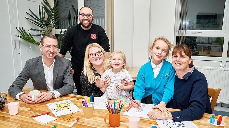 Peter and a family at a Watford welcoming space